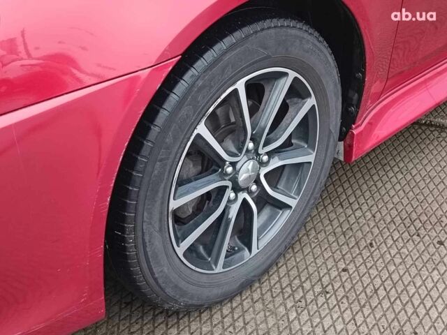 Красный Мицубиси Лансер, объемом двигателя 2 л и пробегом 136 тыс. км за 10990 $, фото 5 на Automoto.ua