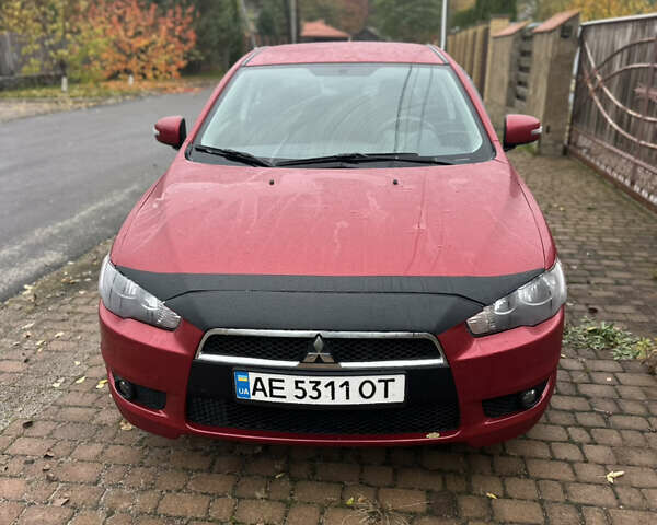 Красный Мицубиси Лансер, объемом двигателя 2 л и пробегом 70 тыс. км за 7950 $, фото 4 на Automoto.ua