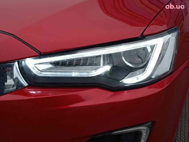 Красный Мицубиси Лансер, объемом двигателя 2 л и пробегом 136 тыс. км за 10990 $, фото 4 на Automoto.ua