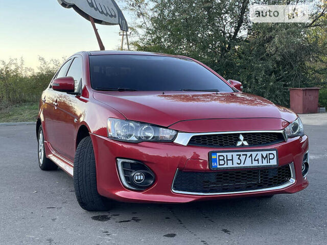 Червоний Міцубісі Lancer, об'ємом двигуна 2 л та пробігом 140 тис. км за 9900 $, фото 28 на Automoto.ua