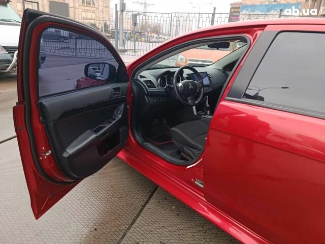 Красный Мицубиси Лансер, объемом двигателя 2 л и пробегом 136 тыс. км за 10990 $, фото 13 на Automoto.ua
