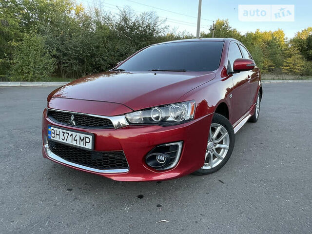 Червоний Міцубісі Lancer, об'ємом двигуна 2 л та пробігом 140 тис. км за 9900 $, фото 20 на Automoto.ua