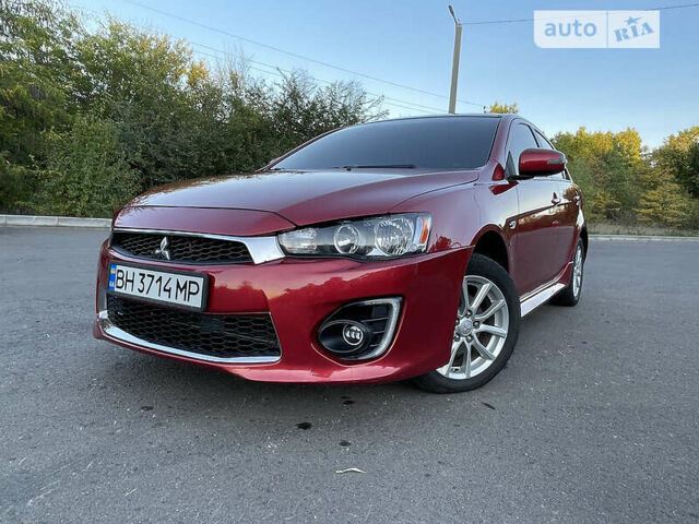 Червоний Міцубісі Lancer, об'ємом двигуна 2 л та пробігом 140 тис. км за 9900 $, фото 21 на Automoto.ua