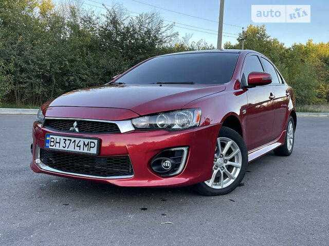 Червоний Міцубісі Lancer, об'ємом двигуна 2 л та пробігом 140 тис. км за 9900 $, фото 22 на Automoto.ua