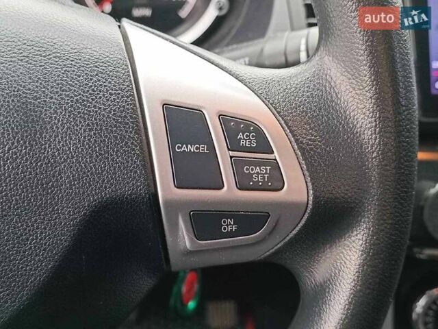 Червоний Міцубісі Lancer, об'ємом двигуна 2 л та пробігом 136 тис. км за 10990 $, фото 21 на Automoto.ua