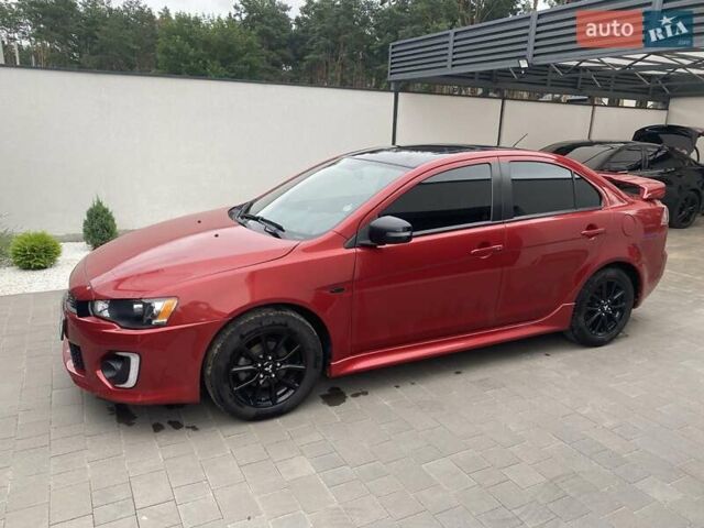Червоний Міцубісі Lancer, об'ємом двигуна 2 л та пробігом 90 тис. км за 9490 $, фото 3 на Automoto.ua