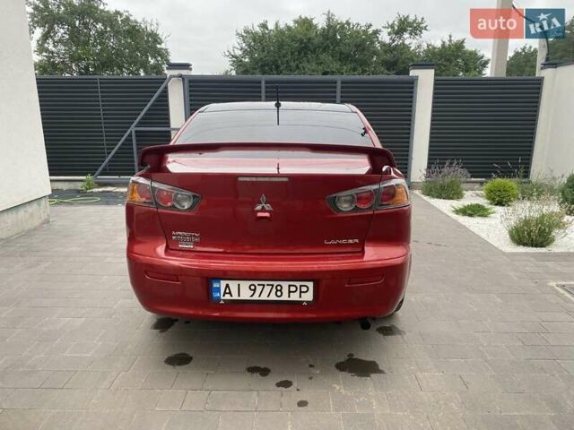 Червоний Міцубісі Lancer, об'ємом двигуна 2 л та пробігом 90 тис. км за 9490 $, фото 8 на Automoto.ua
