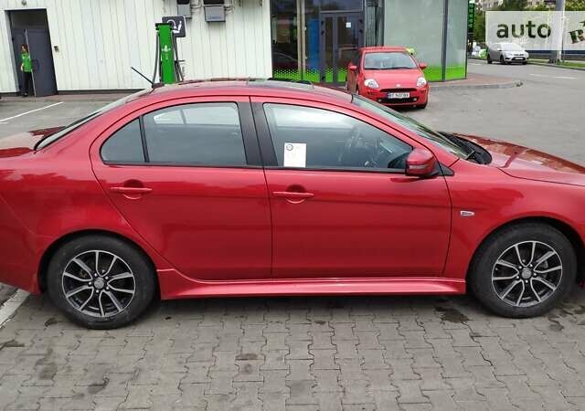 Червоний Міцубісі Lancer, об'ємом двигуна 2 л та пробігом 86 тис. км за 11500 $, фото 3 на Automoto.ua