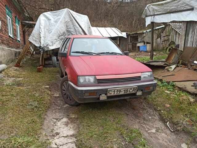 Красный Мицубиси Лансер, объемом двигателя 1.8 л и пробегом 250 тыс. км за 700 $, фото 1 на Automoto.ua