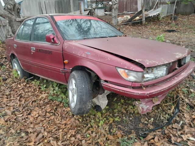 Красный Мицубиси Лансер, объемом двигателя 0 л и пробегом 2 тыс. км за 650 $, фото 1 на Automoto.ua