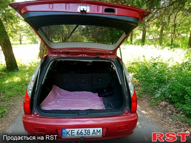 Красный Мицубиси Лансер, объемом двигателя 1.6 л и пробегом 335 тыс. км за 4830 $, фото 6 на Automoto.ua