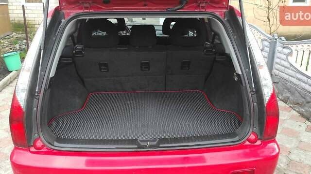 Красный Мицубиси Лансер, объемом двигателя 2 л и пробегом 200 тыс. км за 4500 $, фото 1 на Automoto.ua