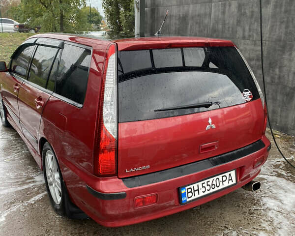 Червоний Міцубісі Lancer, об'ємом двигуна 1.6 л та пробігом 205 тис. км за 4400 $, фото 6 на Automoto.ua