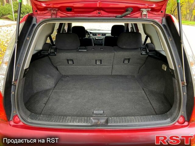 Красный Мицубиси Лансер, объемом двигателя 1.6 л и пробегом 214 тыс. км за 3999 $, фото 10 на Automoto.ua