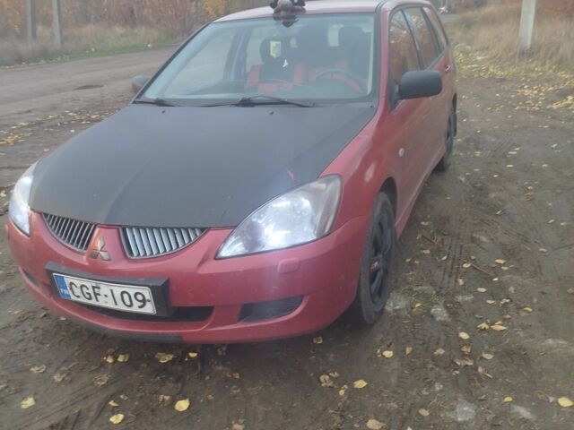 Червоний Міцубісі Lancer, об'ємом двигуна 1.6 л та пробігом 260 тис. км за 3000 $, фото 4 на Automoto.ua