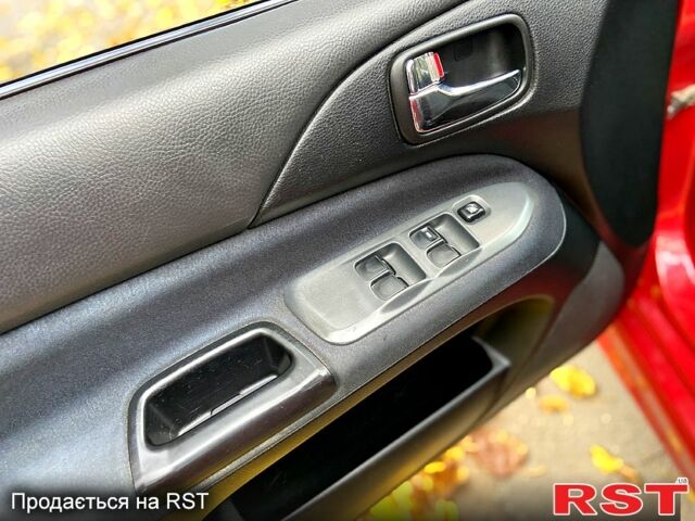 Красный Мицубиси Лансер, объемом двигателя 1.6 л и пробегом 214 тыс. км за 3999 $, фото 8 на Automoto.ua