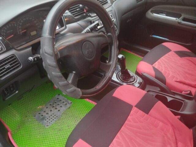 Червоний Міцубісі Lancer, об'ємом двигуна 1.6 л та пробігом 260 тис. км за 3000 $, фото 2 на Automoto.ua