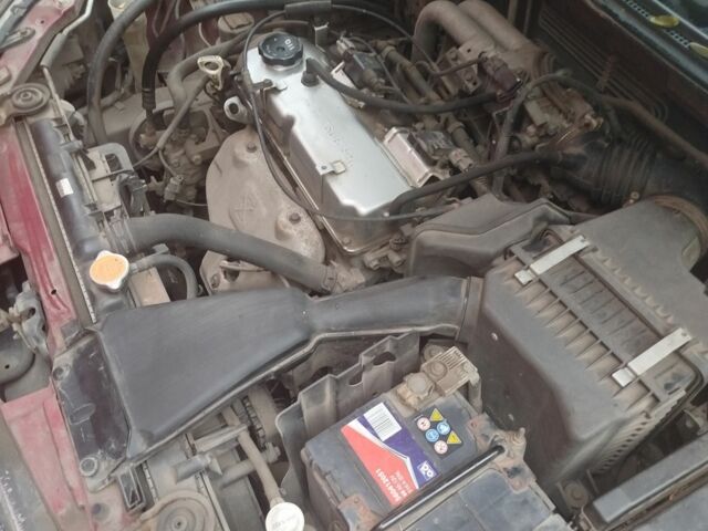 Червоний Міцубісі Lancer, об'ємом двигуна 1.6 л та пробігом 260 тис. км за 3000 $, фото 1 на Automoto.ua