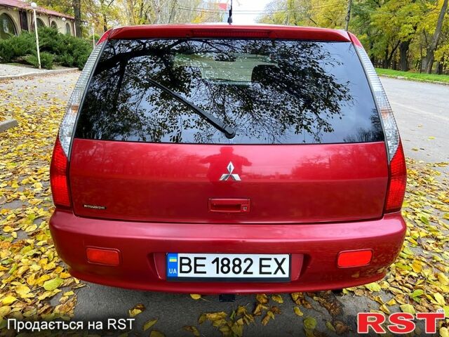 Красный Мицубиси Лансер, объемом двигателя 1.6 л и пробегом 214 тыс. км за 3999 $, фото 4 на Automoto.ua