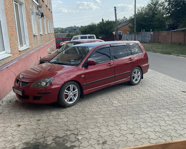 Червоний Міцубісі Lancer, об'ємом двигуна 1.6 л та пробігом 205 тис. км за 4400 $, фото 7 на Automoto.ua