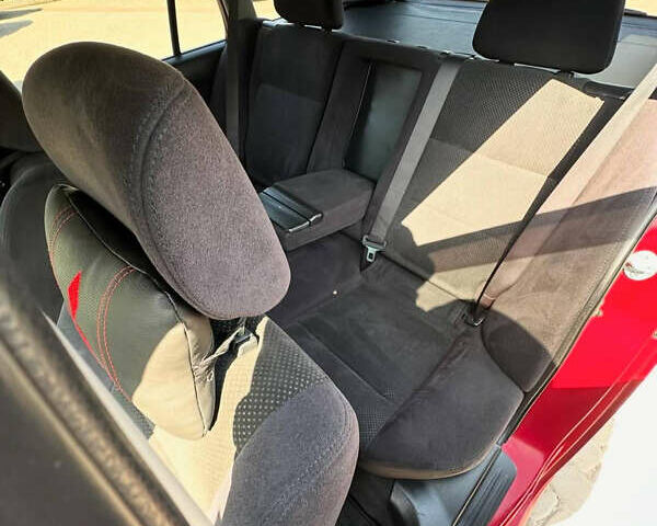 Червоний Міцубісі Lancer, об'ємом двигуна 1.6 л та пробігом 205 тис. км за 4400 $, фото 4 на Automoto.ua