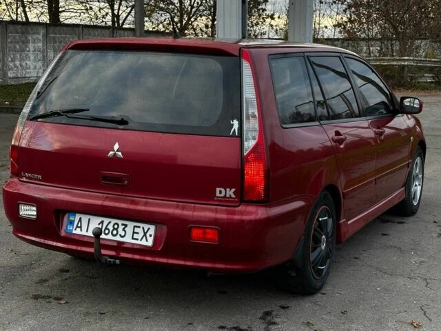 Красный Мицубиси Лансер, объемом двигателя 1.6 л и пробегом 290 тыс. км за 2800 $, фото 3 на Automoto.ua