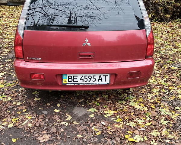 Красный Мицубиси Лансер, объемом двигателя 1.6 л и пробегом 217 тыс. км за 3750 $, фото 3 на Automoto.ua