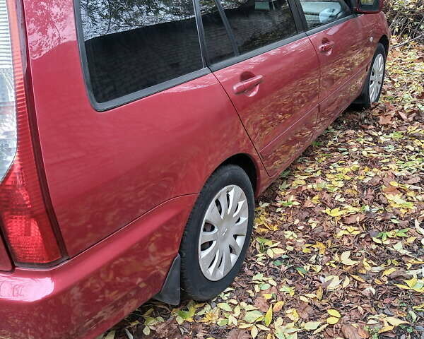 Красный Мицубиси Лансер, объемом двигателя 1.6 л и пробегом 217 тыс. км за 3750 $, фото 2 на Automoto.ua