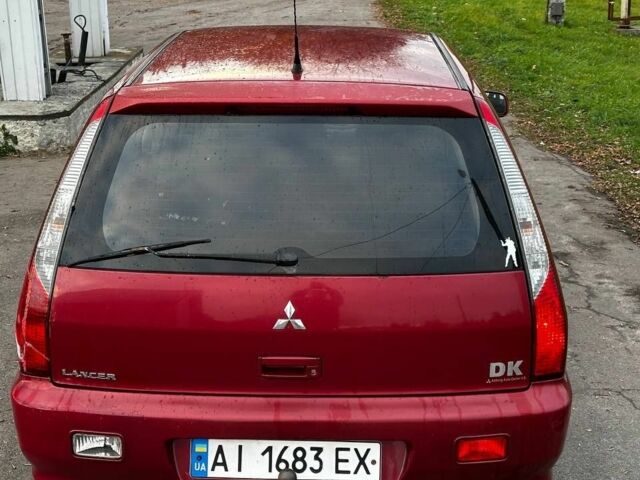 Красный Мицубиси Лансер, объемом двигателя 1.6 л и пробегом 290 тыс. км за 2800 $, фото 2 на Automoto.ua