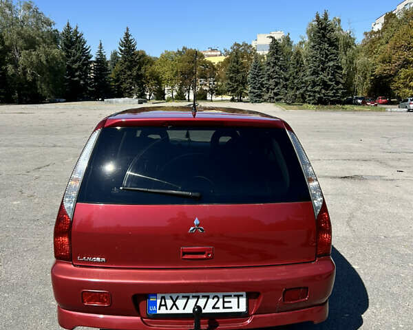 Червоний Міцубісі Lancer, об'ємом двигуна 1.6 л та пробігом 244 тис. км за 3900 $, фото 4 на Automoto.ua