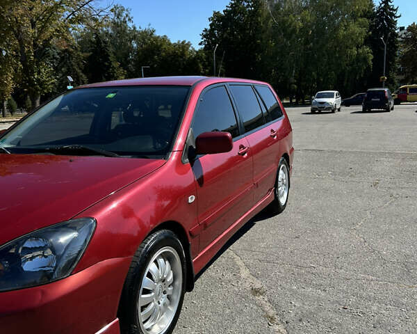 Червоний Міцубісі Lancer, об'ємом двигуна 1.6 л та пробігом 244 тис. км за 3900 $, фото 6 на Automoto.ua