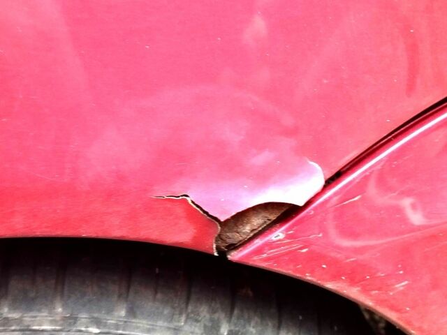 Красный Мицубиси Лансер, объемом двигателя 1.6 л и пробегом 225 тыс. км за 2500 $, фото 3 на Automoto.ua