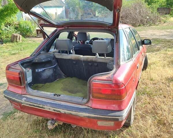 Красный Мицубиси Лансер, объемом двигателя 1.5 л и пробегом 250 тыс. км за 1600 $, фото 14 на Automoto.ua