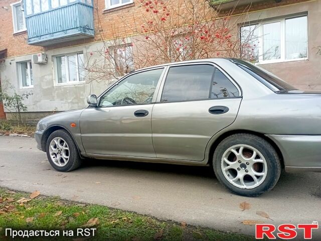 Міцубісі Lancer, об'ємом двигуна 1.6 л та пробігом 272 тис. км за 2100 $, фото 2 на Automoto.ua