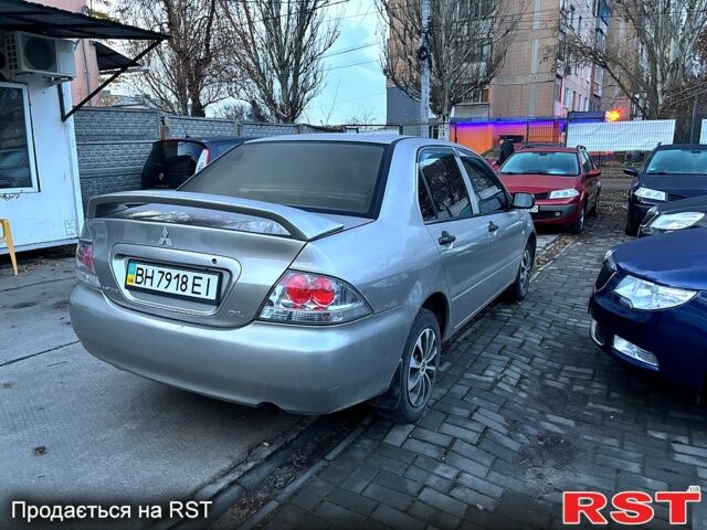 Мицубиси Лансер, объемом двигателя 1.3 л и пробегом 230 тыс. км за 2800 $, фото 6 на Automoto.ua