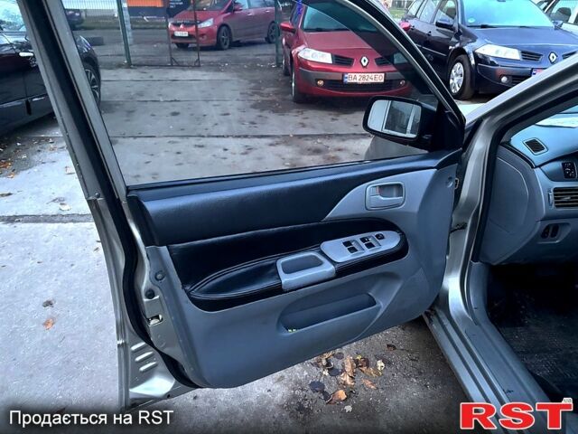 Мицубиси Лансер, объемом двигателя 1.3 л и пробегом 230 тыс. км за 2800 $, фото 7 на Automoto.ua