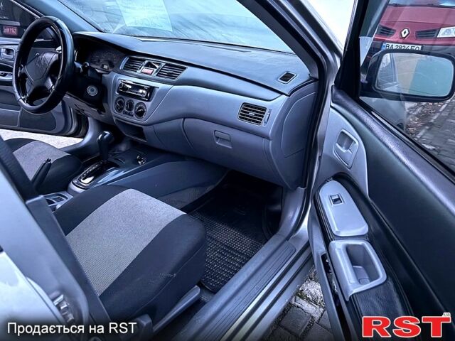 Мицубиси Лансер, объемом двигателя 1.3 л и пробегом 230 тыс. км за 2800 $, фото 11 на Automoto.ua