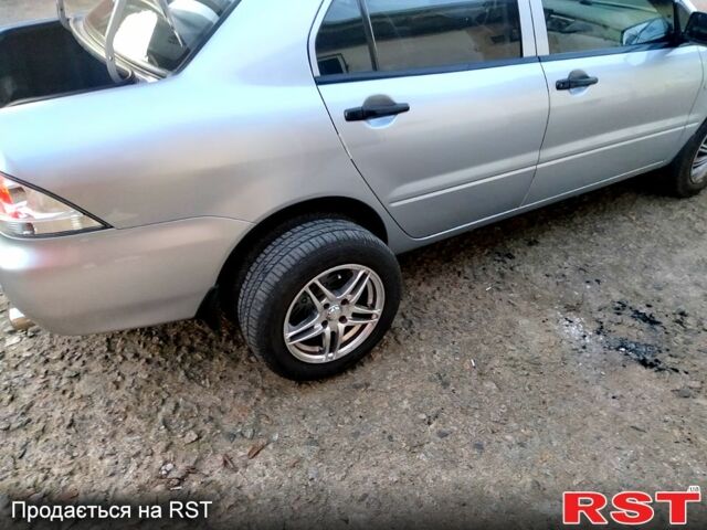 Міцубісі Lancer, об'ємом двигуна 1.3 л та пробігом 195 тис. км за 4700 $, фото 8 на Automoto.ua