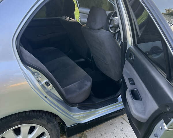 Мицубиси Лансер, объемом двигателя 1.6 л и пробегом 292 тыс. км за 4300 $, фото 8 на Automoto.ua