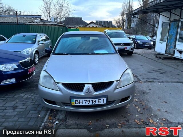 Мицубиси Лансер, объемом двигателя 1.3 л и пробегом 230 тыс. км за 2800 $, фото 1 на Automoto.ua