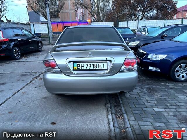 Мицубиси Лансер, объемом двигателя 1.3 л и пробегом 230 тыс. км за 2800 $, фото 5 на Automoto.ua