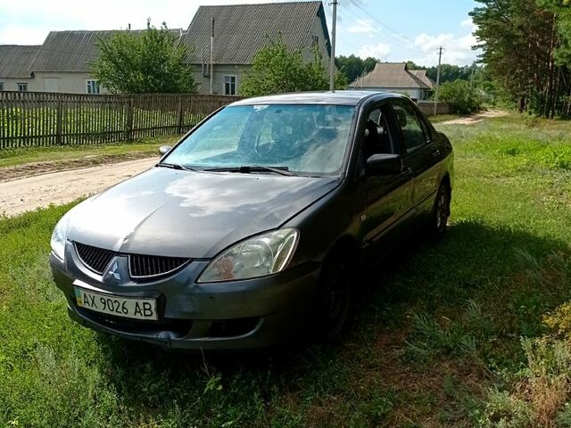 Мицубиси Лансер, объемом двигателя 1.6 л и пробегом 256 тыс. км за 1500 $, фото 5 на Automoto.ua