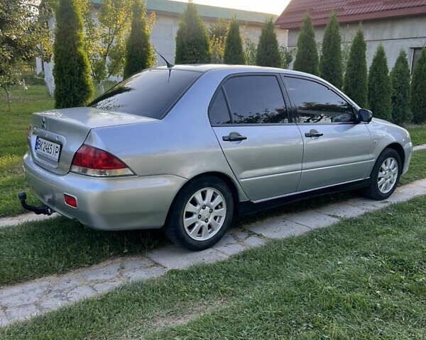 Мицубиси Лансер, объемом двигателя 1.6 л и пробегом 292 тыс. км за 4300 $, фото 4 на Automoto.ua