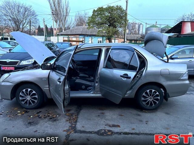 Мицубиси Лансер, объемом двигателя 1.3 л и пробегом 230 тыс. км за 2800 $, фото 12 на Automoto.ua