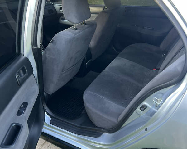 Мицубиси Лансер, объемом двигателя 1.6 л и пробегом 292 тыс. км за 4300 $, фото 9 на Automoto.ua