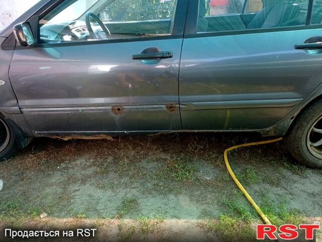 Мицубиси Лансер, объемом двигателя 1.6 л и пробегом 256 тыс. км за 1500 $, фото 1 на Automoto.ua