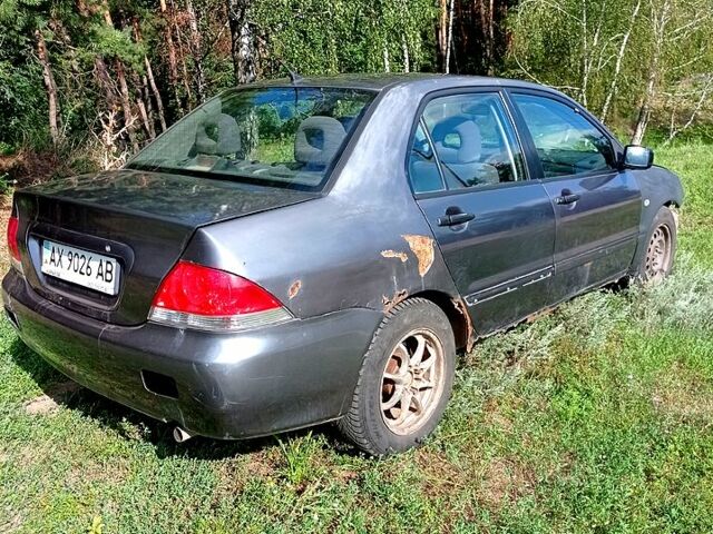 Мицубиси Лансер, объемом двигателя 1.6 л и пробегом 256 тыс. км за 1500 $, фото 3 на Automoto.ua