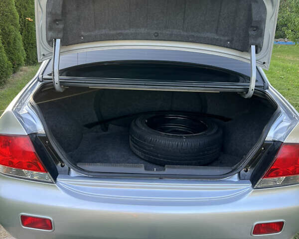 Мицубиси Лансер, объемом двигателя 1.6 л и пробегом 292 тыс. км за 4300 $, фото 7 на Automoto.ua