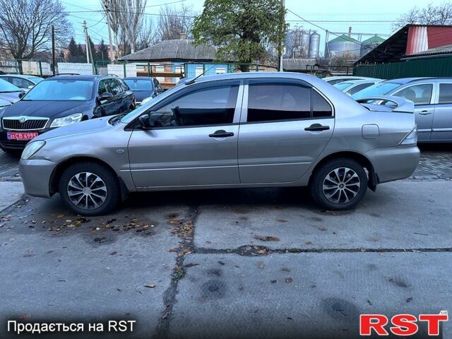 Мицубиси Лансер, объемом двигателя 1.3 л и пробегом 230 тыс. км за 2800 $, фото 3 на Automoto.ua