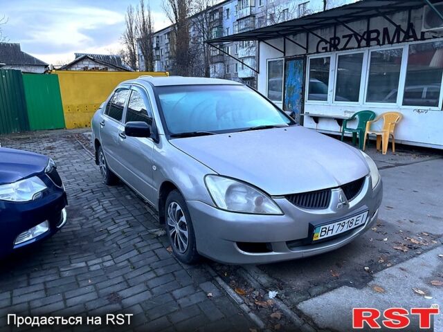 Мицубиси Лансер, объемом двигателя 1.3 л и пробегом 230 тыс. км за 2800 $, фото 2 на Automoto.ua